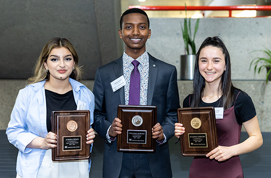 Photo of the winners of the 2022 Michael A. Strembitsky Award of Excellence holding their plaques: Ayesha Irfan (bronze), Jonathan Afowork (silver) and Juliana Concini (gold).
